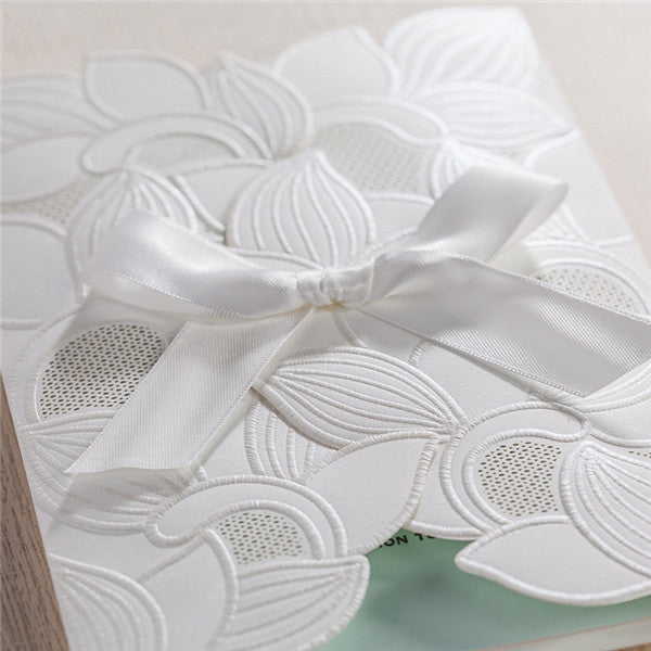 Shiny traditional white folded laser cut wedding invitations LC028_2