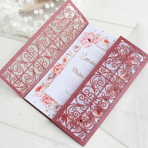 Burgundy laser cut wedding invitations with floral designs