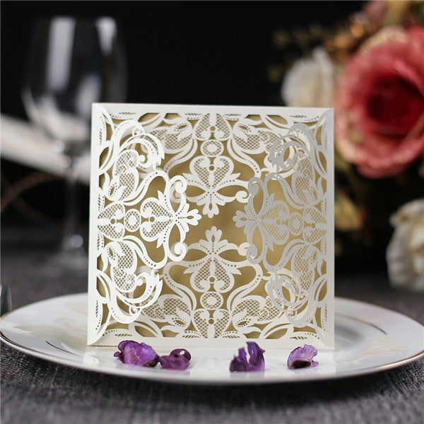 Delicate vintage ivory laser cut wedding invitations LC047_1